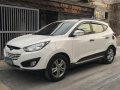 2013 Hyundai Tucson 2.0L CRDi R-EVGT 2-5