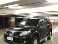 XTREME BLACK 2013 TOYOTA FORTUNER V 3.0L 4x4 TOP OF THE LINE AT LOW PRICE AVAILABLE IN EASTWOOD QC-0