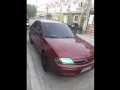 Sell Red 2001 Ford Lynx Sedan in Mabalacat-0