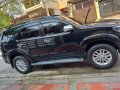 Black Toyota Fortuner 2013 SUV / MPV for sale in Quezon City-3