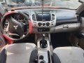 Red Mitsubishi Strada 2010 Truck for sale-0