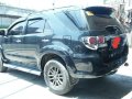 Black Toyota Fortuner 2014 SUV / MPV for sale in Manila-7