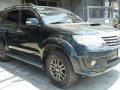 Black Toyota Fortuner 2014 SUV / MPV for sale in Manila-2