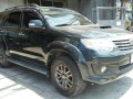 Black Toyota Fortuner 2014 SUV / MPV for sale in Manila-6
