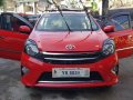 Selling Red Toyota Wigo 2016 in Manila-0