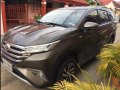 Brown Toyota Rush 2018 for sale in Batangas City-8