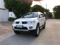 Pearl White Mitsubishi Montero Sport 2013 for sale in Quezon City-0