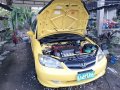 Yellow Honda Civic 2004 for sale in Sta. Rosa-Nuvali Rd.-5