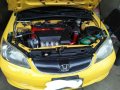 Yellow Honda Civic 2004 for sale in Sta. Rosa-Nuvali Rd.-1