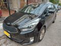 Black Kia Carens for sale in Manila-8