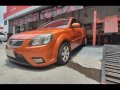 Selling Orange Kia Rio 2010 Sedan in Manila-7