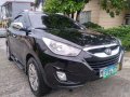 Black Hyundai Tucson 2011 for sale in Manila-8