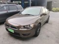 Selling Beige Mitsubishi Lancer in Parañaque-1