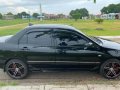 Black Mitsubishi Lancer for sale in Rosario-8