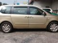 Sell Beige Kia Carnival in San Antonio-1