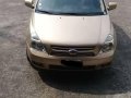 Sell Beige Kia Carnival in San Antonio-1