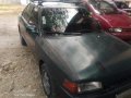 Sell Black Mazda 323 for sale in Valenzuela-1