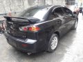 Selling Black Mitsubishi Lancer for sale in Quezon City-6