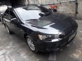 Selling Black Mitsubishi Lancer for sale in Quezon City-7