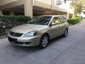 Selling Beige Mitsubishi Lancer for sale in Manila-7