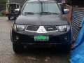 Black Mitsubishi Strada 2013 for sale in Baguio City-4