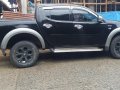 Black Mitsubishi Strada 2013 for sale in Baguio City-6