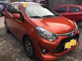 Selling Orange Toyota Wigo in Dasmariñas-1