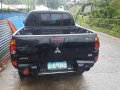 Black Mitsubishi Strada 2013 for sale in Baguio City-2