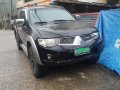 Black Mitsubishi Strada 2013 for sale in Baguio City-3