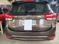 Brown Kia Carens for sale in Butuan-9