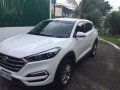 Sell White Hyundai Tucson in Pateros-1