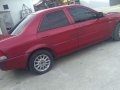 Selling Red Ford Lynx for sale in Jaen-1