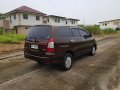 Brown Toyota Innova for sale in Manila-4