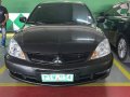 Black Mitsubishi Lancer for sale in Bacoor-0