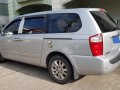 Selling Silver Kia Carnival 2010 Van in Manila-2