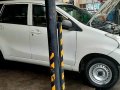 Selling White Toyota Avanza in Makati-4