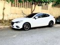 White Mazda 2 for sale in Quezon City-7