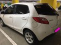 Selling White Mazda 2 in Manila-1