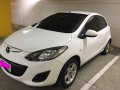 Selling White Mazda 2 in Manila-0