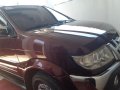 Dark Red Isuzu Sportivo 2012 at a good price for sale in Tagum-0