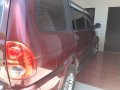 Dark Red Isuzu Sportivo 2012 at a good price for sale in Tagum-1