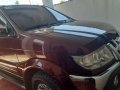 Dark Red Isuzu Sportivo 2012 at good price for sale in Tagum City-0