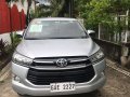 SILVER METALLIC TOYOTA INNOVA 2.8 E M/T 2018 with Franchise and Airport Sticker -0