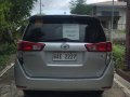 SILVER METALLIC TOYOTA INNOVA 2.8 E M/T 2018 with Franchise and Airport Sticker -1