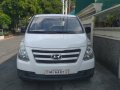 Selling White Hyundai Grand Starex 2017 in Lopez Village Covered Court-0