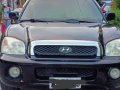 Black Hyundai Santa Fe 2014 for sale in Davao -5