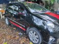 Selling Black Toyota Wigo 2014 in Cabuyao-0