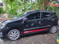 Selling Black Toyota Wigo 2014 in Cabuyao-5