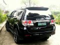 Black Toyota Fortuner 2012 SUV Automatic for sale in Manila-3