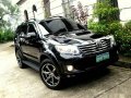 Black Toyota Fortuner 2012 SUV Automatic for sale in Manila-4